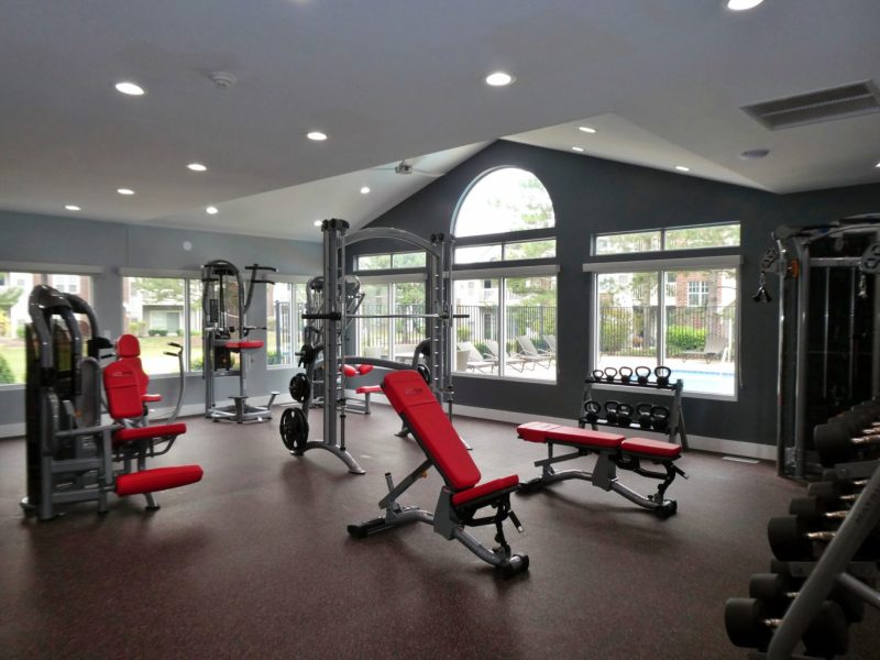 This image shows the 24-hour State-of-the-art fitness gym featuring different equipment that is essential for community amenities. The Athletic Club is also offering the different weight of kettlebells that is good for point gravity off-centered.